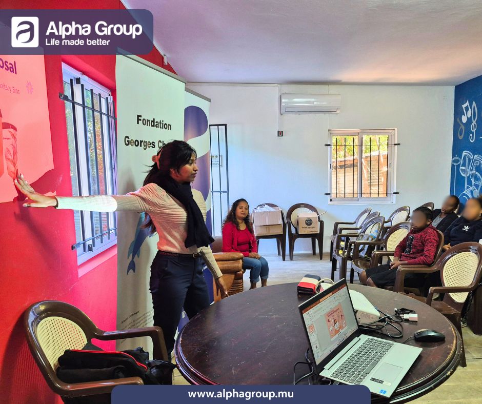 Facilitator presenting menstrual hygiene education with a focus on sanitary bin service during a session with young learners